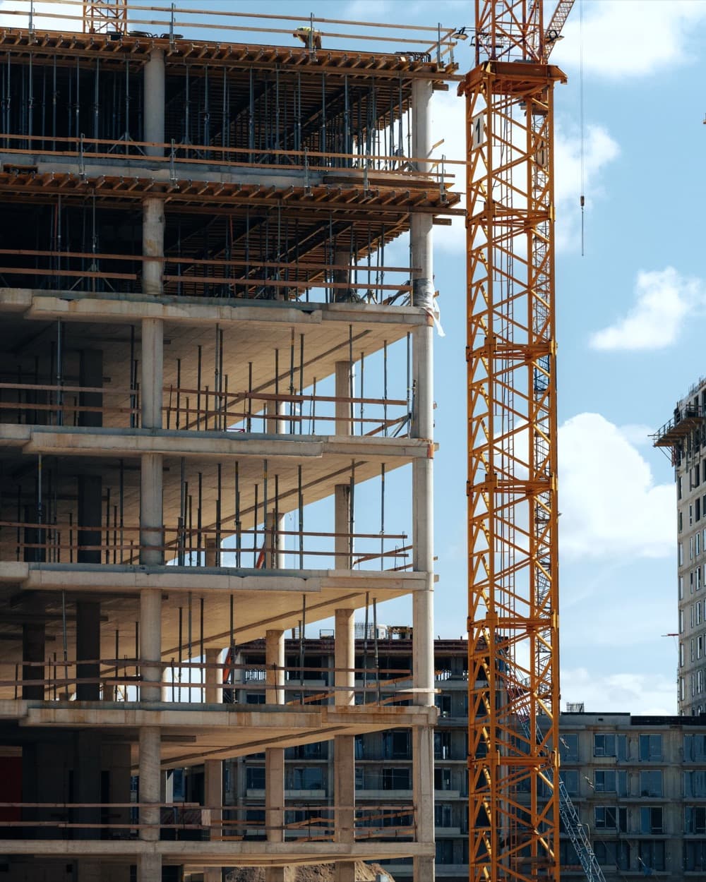 Building shell with a tower crane